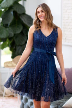 TRUDY SLEEVELESS SHORT GLITTER DRESS