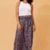 ADDISON FLARED BORDER PRINT PANTS -Printedcarpetus df8b4239613a008378b380cff2bf13fa