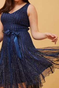 TRUDY SLEEVELESS SHORT GLITTER DRESS 15 TRUDY SLEEVELESS SHORT GLITTER DRESS -Printedcarpetus f7008d9bc65d38efe7f201754a3603f3